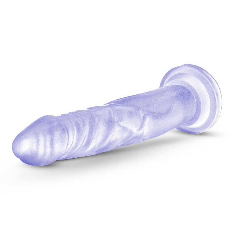 Clear realistic dildo with fine glitter inside with a slim tapered realistic head for easy insertion and subtle veins along the straight but flexible shaft. Suction cup base. Additional images show alternate angles.