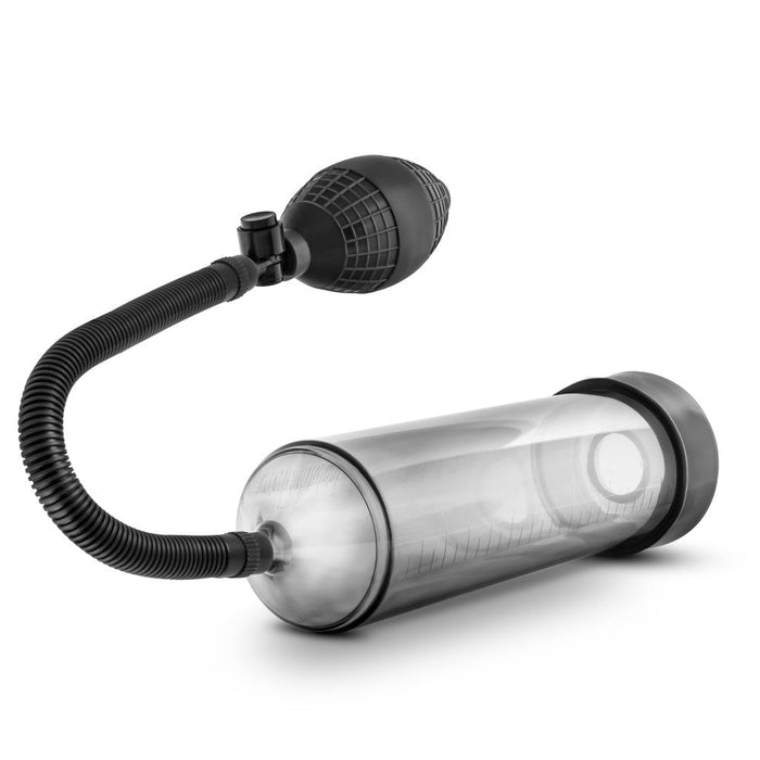 Clear cylinder that connects to a squeezable ball pump by a black flexible hose. Includes black pump sleeve and stretchy .  Additional images show alternate angles.