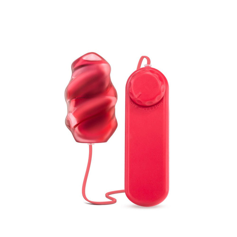An egg shaped bullet with a soft, red sleeve that has a gentle swirl shape for texture. Bullet is connected to a red plastic controller by a thin red cable. Twist dial on controller adjusts intensity. Additional images show alternate angles.