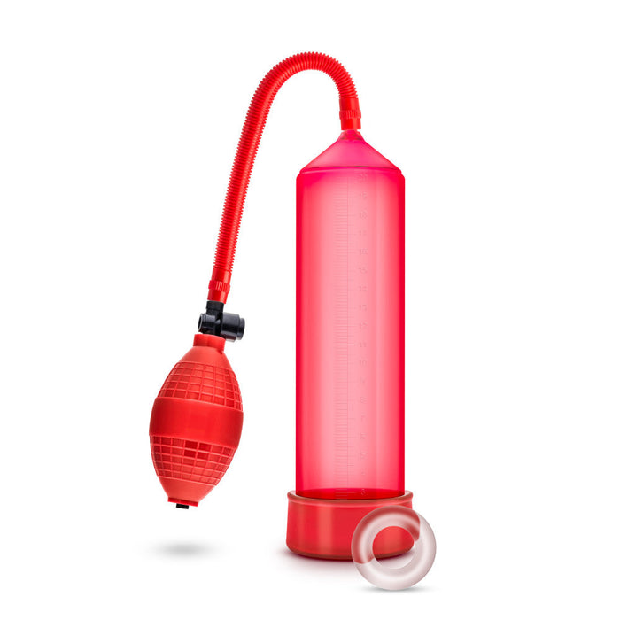 Red cylinder that connects to a squeezable ball pump by a red flexible hose. Includes red pump sleeve and stretchy cock ring.  Additional images show alternate angles.